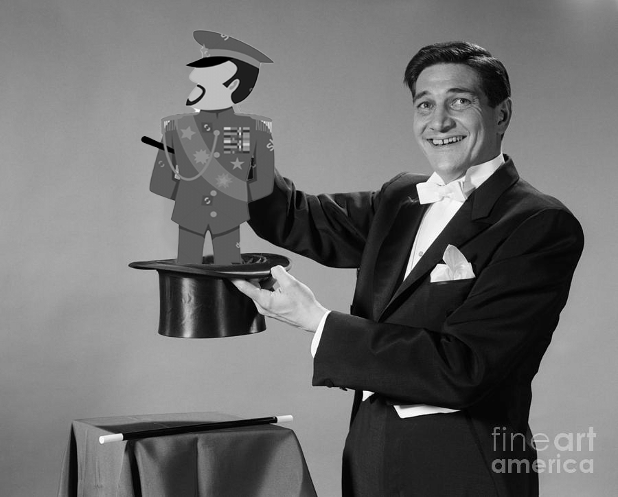 A magician pulls a dictator out of a hat